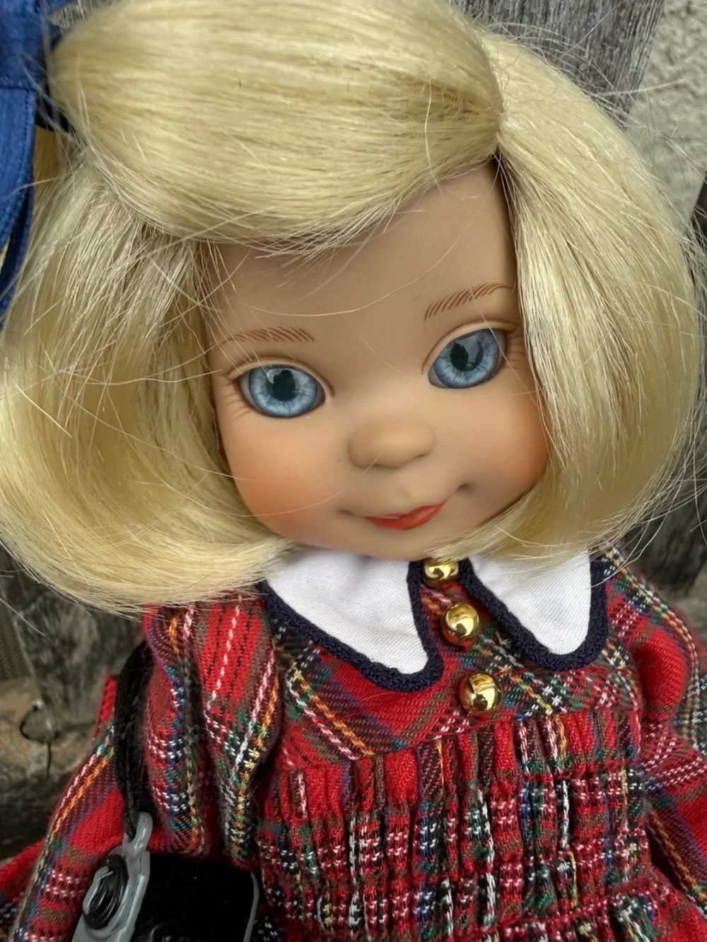 Blonde Blue-Eyed Doll in Red Plaid Dress